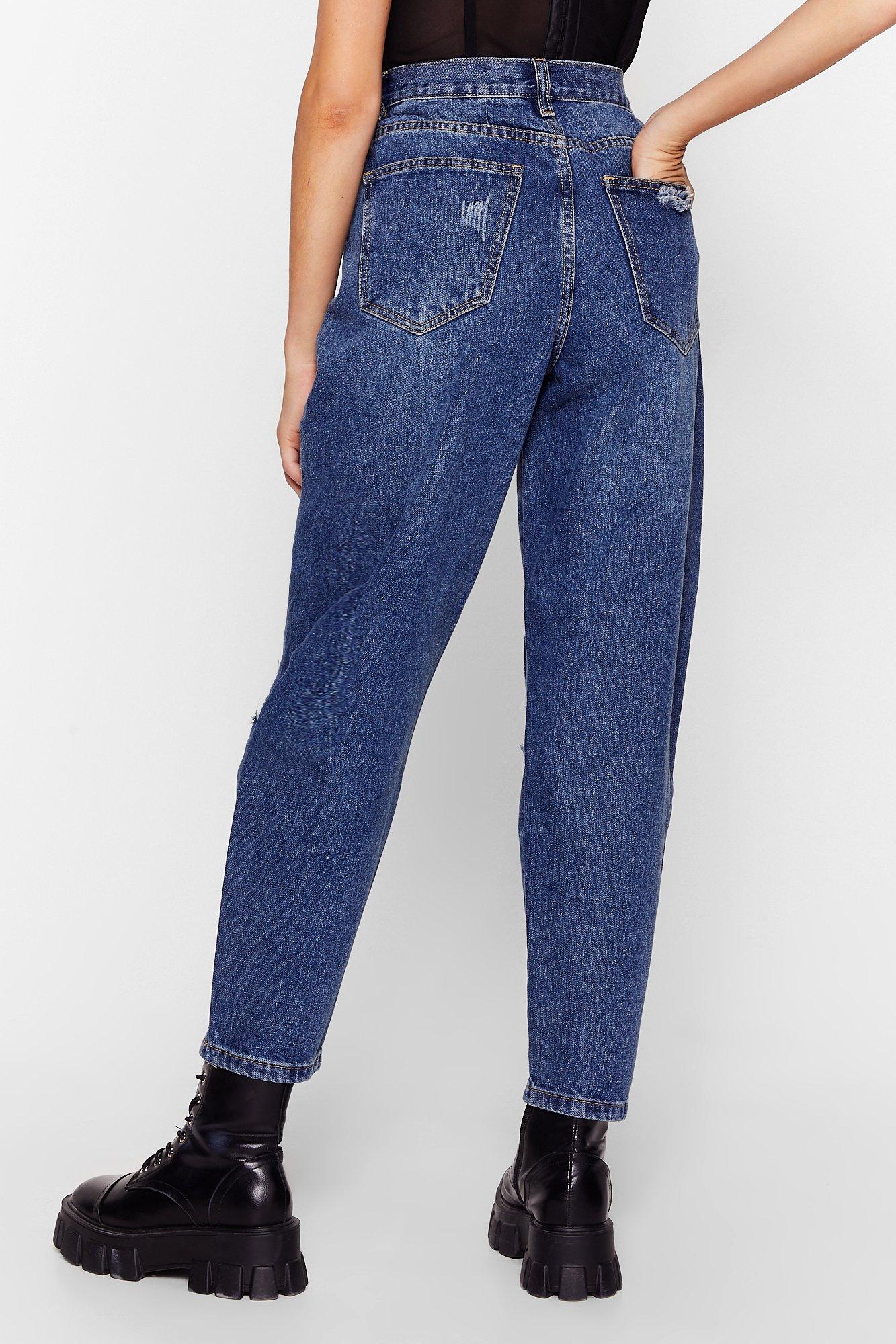 Ripped best sale tapered jeans